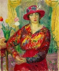Fille en robe rouge et chapeau